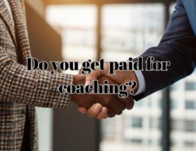 a professional and a coach shaking after payment