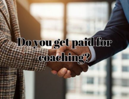 a professional and a coach shaking after payment