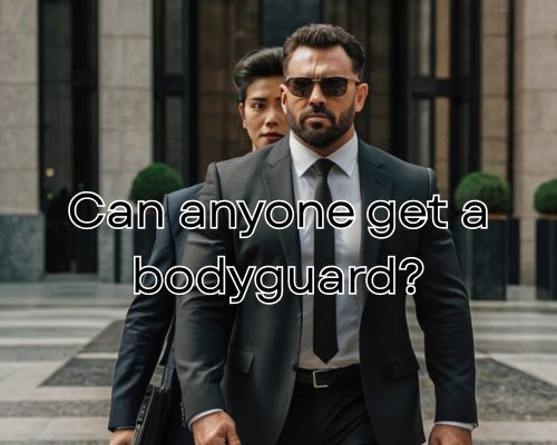 Bodyguard stands firm beside VIP.